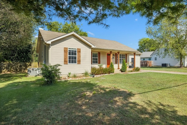 ranch-style home with a front lawn and a porch