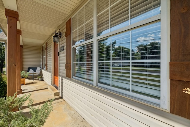 view of home's exterior with covered porch