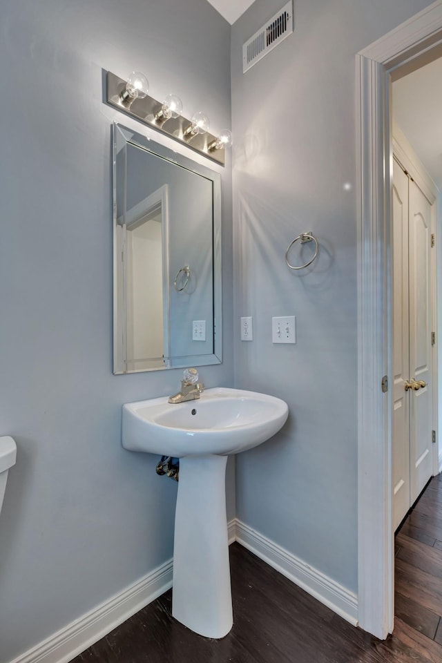 bathroom featuring hardwood / wood-style flooring