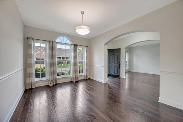 empty room with dark hardwood / wood-style flooring