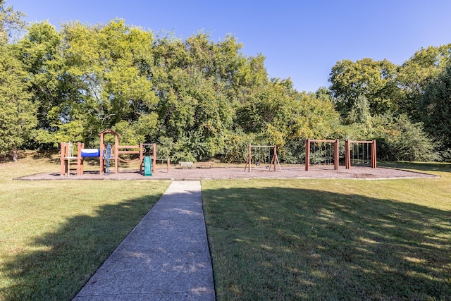 view of playground with a lawn