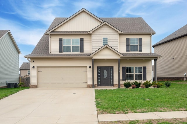 craftsman-style home with central AC unit, a front yard, and a garage