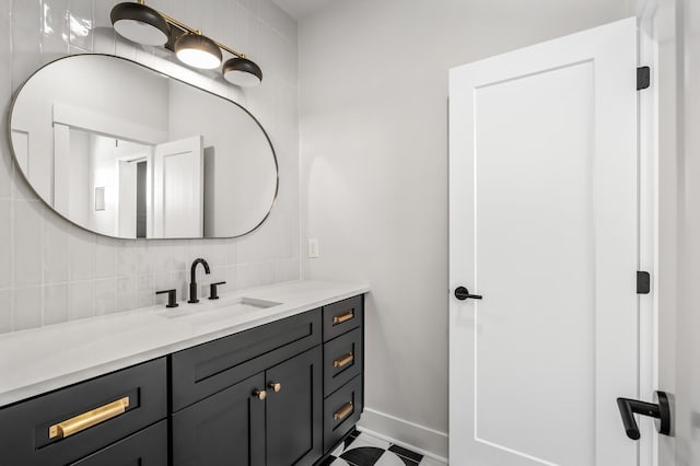 bathroom with vanity and backsplash