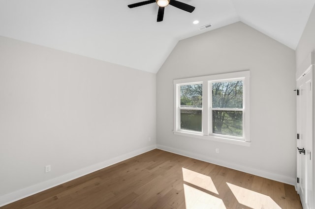 bonus room with ceiling fan, lofted ceiling, and light wood-type flooring