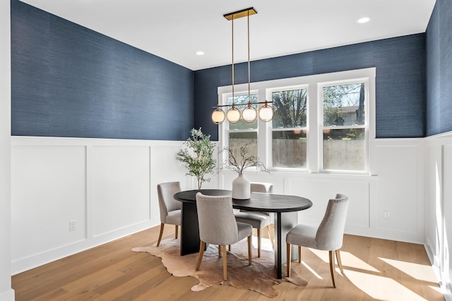 dining area featuring light wood-type flooring