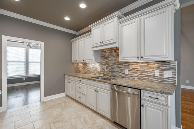 kitchen featuring dishwasher, white cabinetry, crown molding, and sink