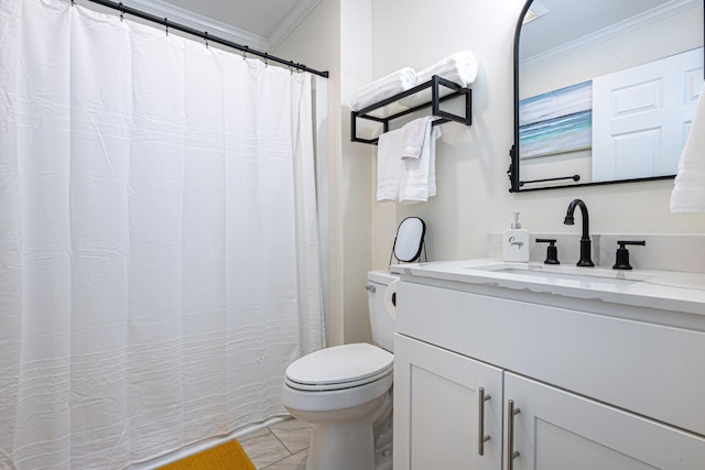 bathroom featuring toilet, vanity, and crown molding