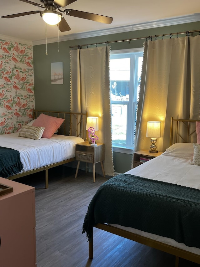 bedroom with ceiling fan, wood-type flooring, and crown molding