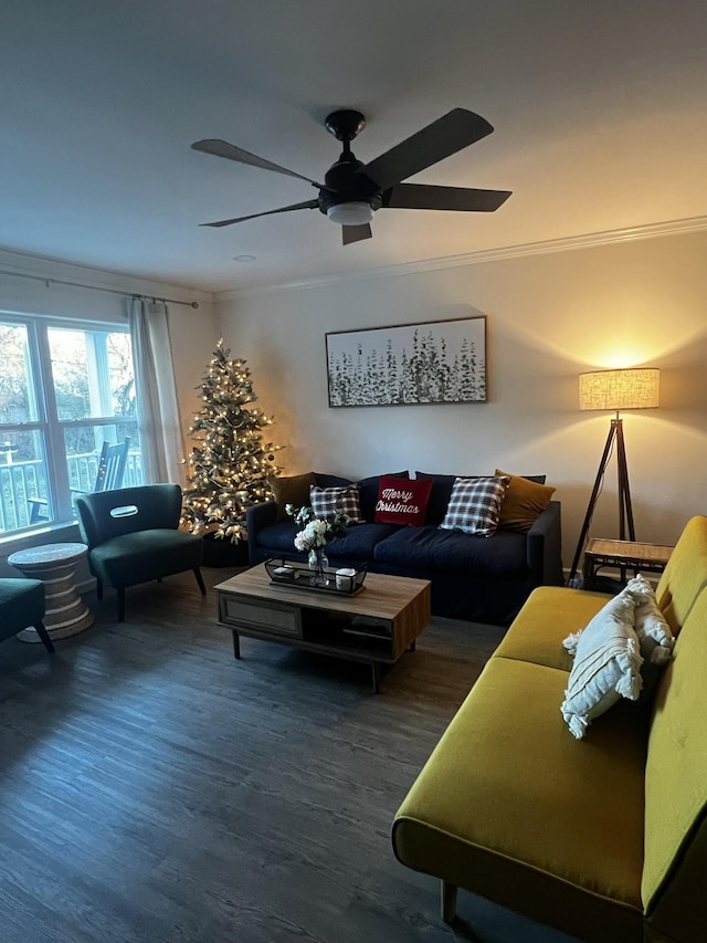 living room with ceiling fan, crown molding, and dark hardwood / wood-style floors