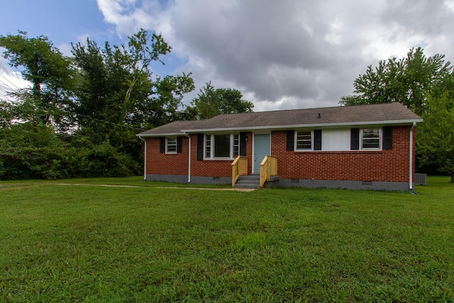 single story home with a front yard