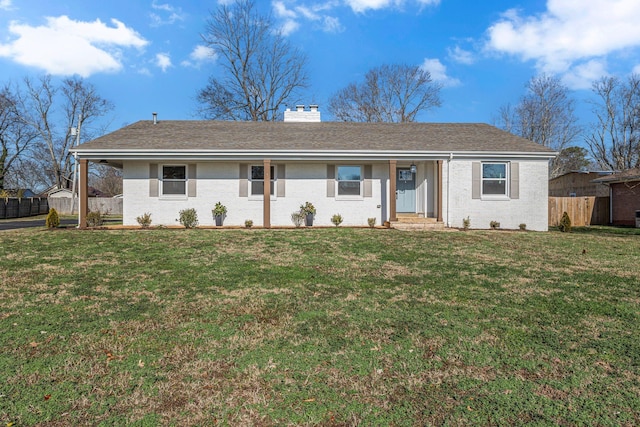 single story home featuring a front yard