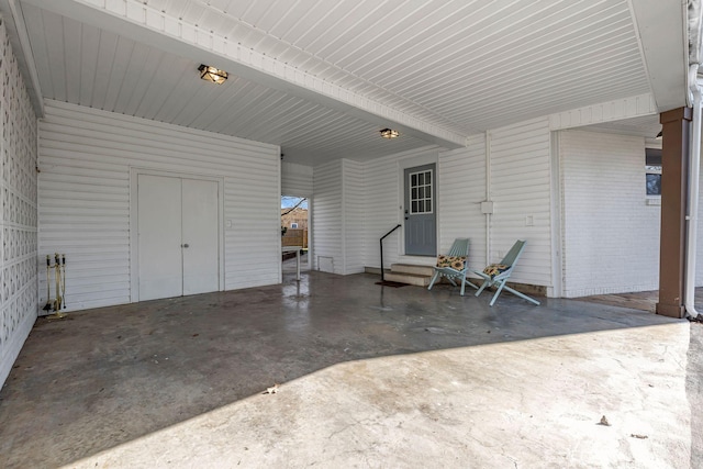 view of patio / terrace with a carport