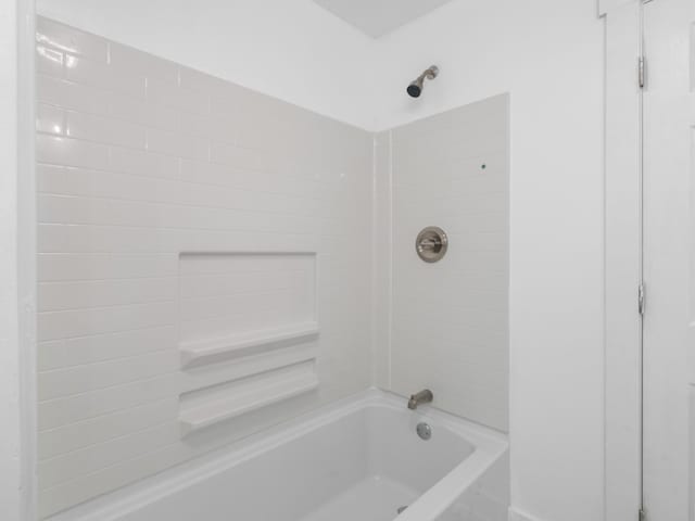 bathroom featuring bathing tub / shower combination