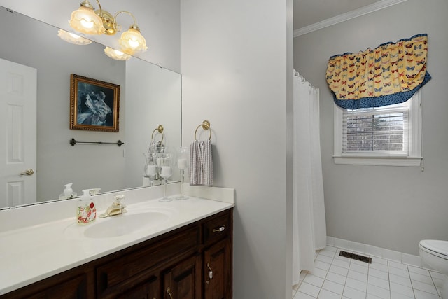 bathroom featuring a notable chandelier, tile patterned floors, crown molding, toilet, and vanity