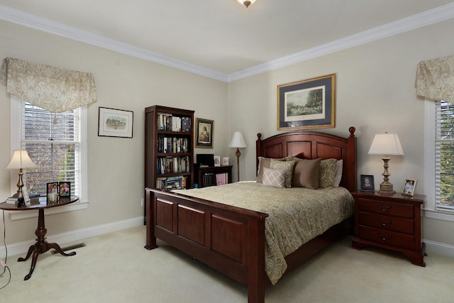 carpeted bedroom with ornamental molding