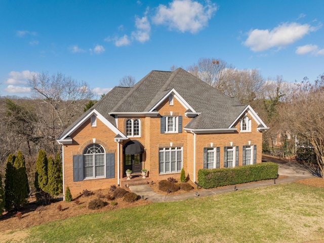 view of front property with a front lawn