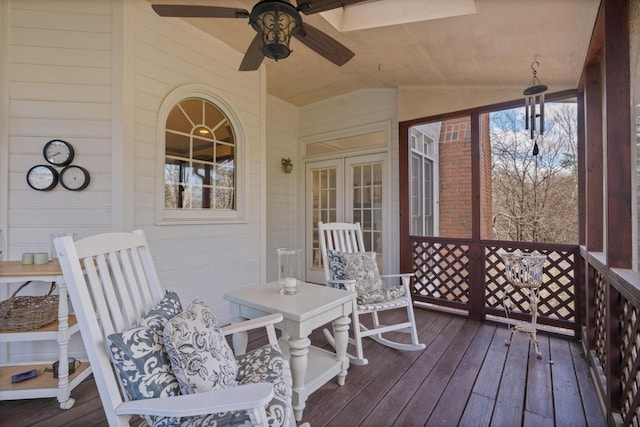 deck featuring french doors and ceiling fan