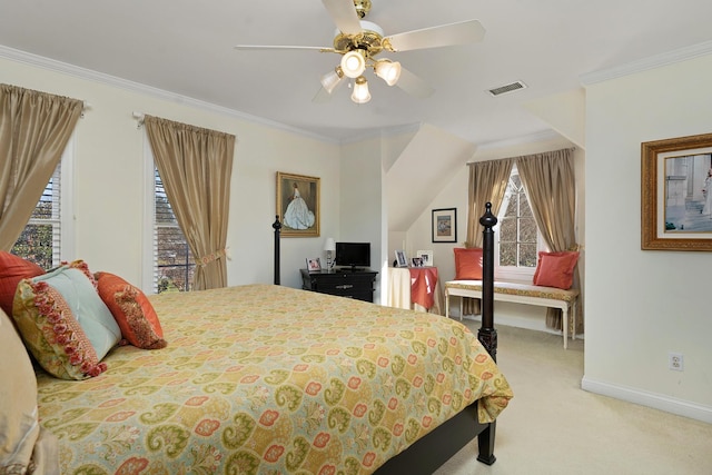 carpeted bedroom featuring ceiling fan and ornamental molding