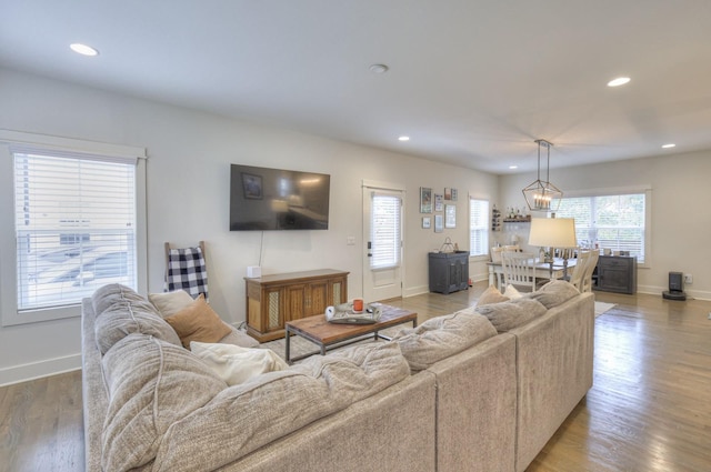 living room with light hardwood / wood-style flooring