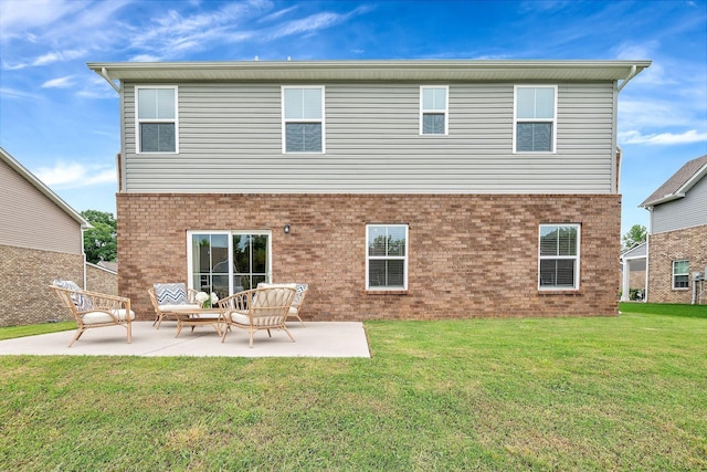 back of property featuring a lawn, a patio area, and outdoor lounge area