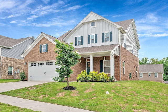 view of front facade with a garage and a front yard