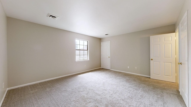 empty room with light carpet