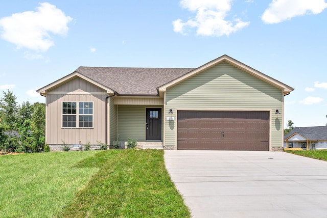 single story home featuring a front yard and a garage