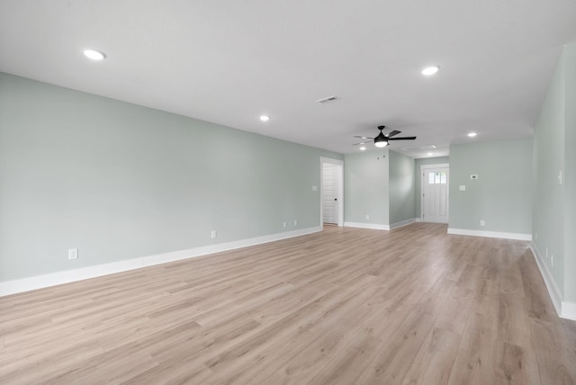 unfurnished room featuring ceiling fan and light hardwood / wood-style flooring