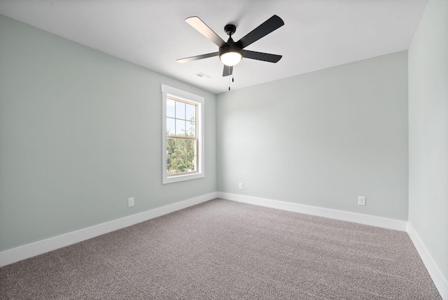 unfurnished room featuring carpet flooring and ceiling fan