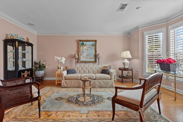 living room featuring light hardwood / wood-style floors and ornamental molding