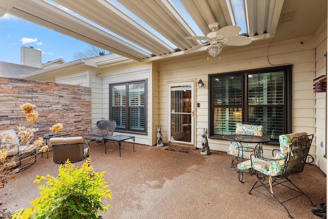 view of patio with ceiling fan