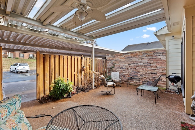 view of patio featuring ceiling fan and area for grilling