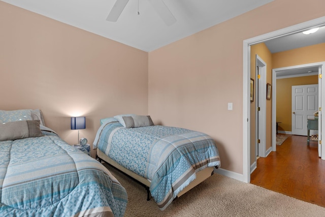 bedroom featuring ceiling fan and carpet floors