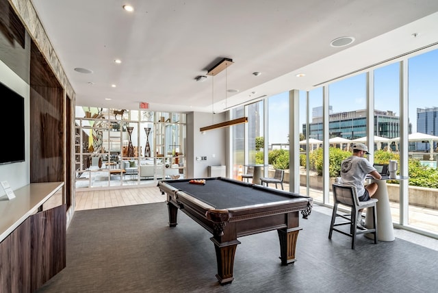 game room featuring carpet flooring, floor to ceiling windows, and billiards