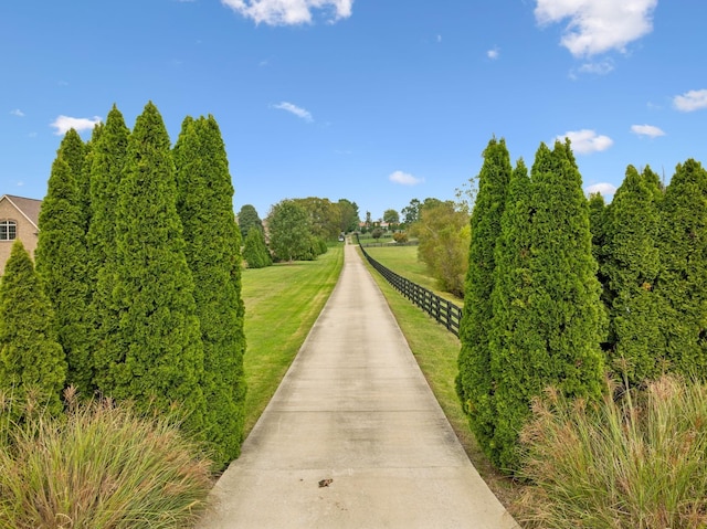 surrounding community featuring a lawn