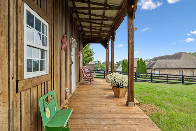 deck featuring a yard