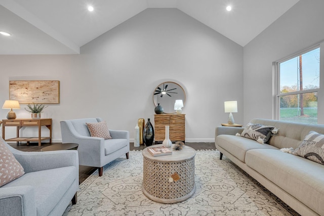 living room with light hardwood / wood-style floors and vaulted ceiling