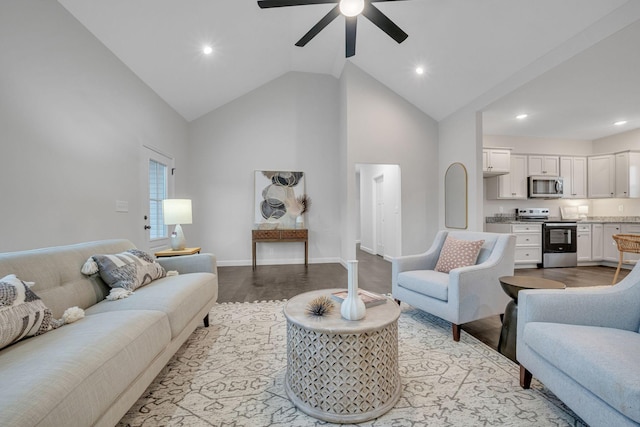 living room featuring ceiling fan, high vaulted ceiling, and light hardwood / wood-style flooring