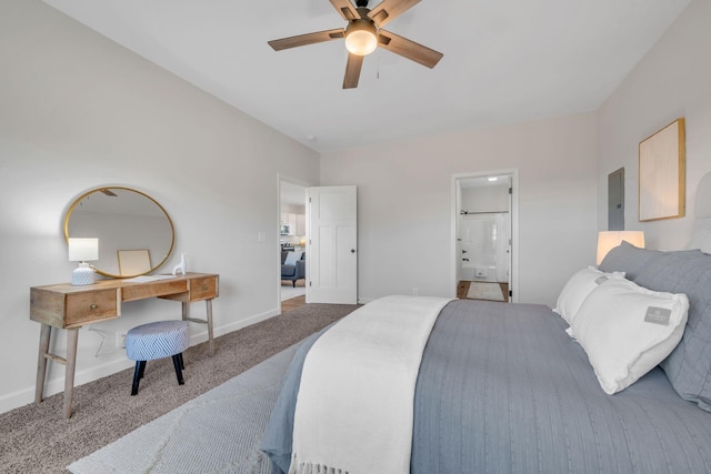 bedroom with connected bathroom, ceiling fan, and carpet