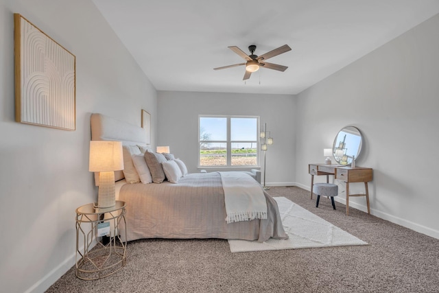 bedroom with ceiling fan and carpet floors