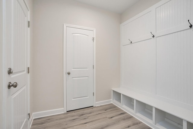 mudroom with light hardwood / wood-style flooring