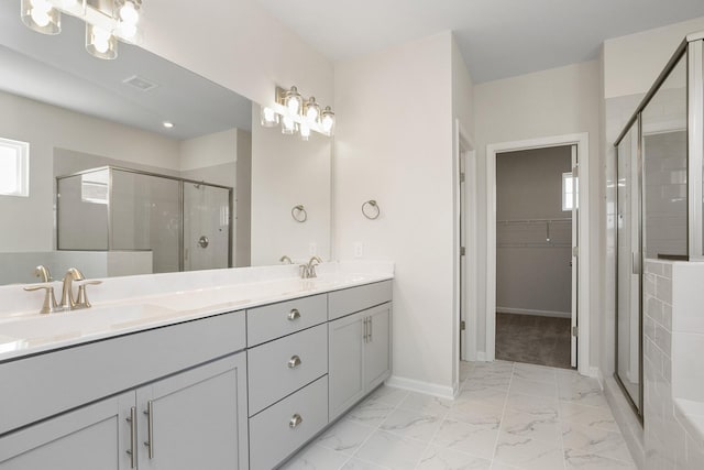 bathroom with vanity and walk in shower