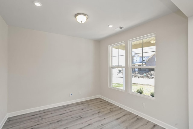 empty room featuring light hardwood / wood-style flooring