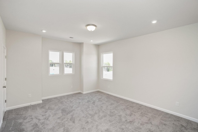 unfurnished room with carpet