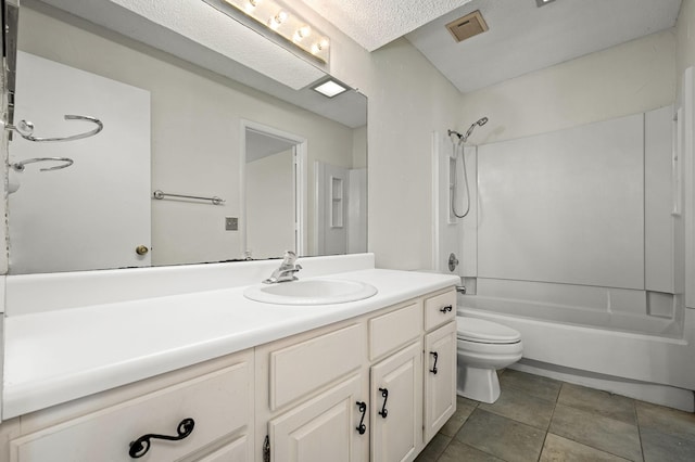 full bathroom featuring shower / bath combination, vanity, tile patterned flooring, toilet, and a textured ceiling