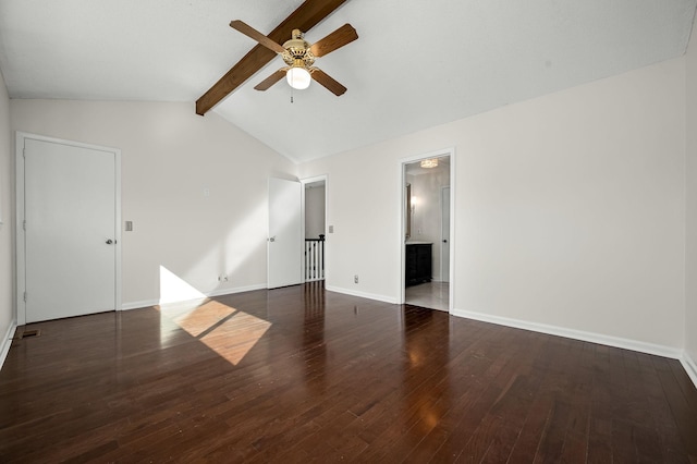 spare room with lofted ceiling with beams, dark wood-type flooring, and ceiling fan