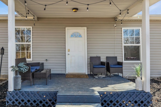 doorway to property with a deck