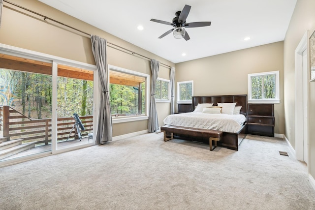 carpeted bedroom with access to exterior and ceiling fan