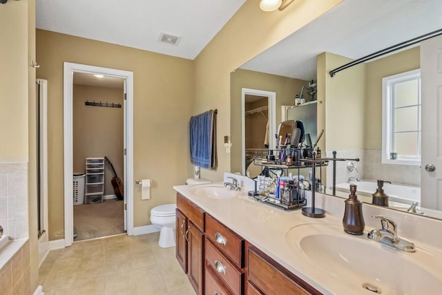 full bathroom with tile patterned flooring, vanity, toilet, and plus walk in shower