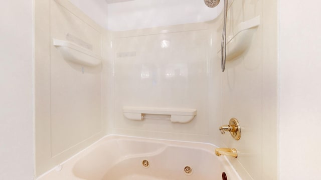 bathroom with bathing tub / shower combination